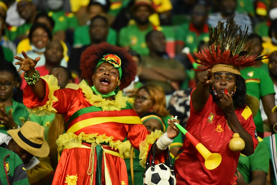 Cameroonians cheer on their football team during the semifinal match between Cameroon and Egypt at ACON 2022.