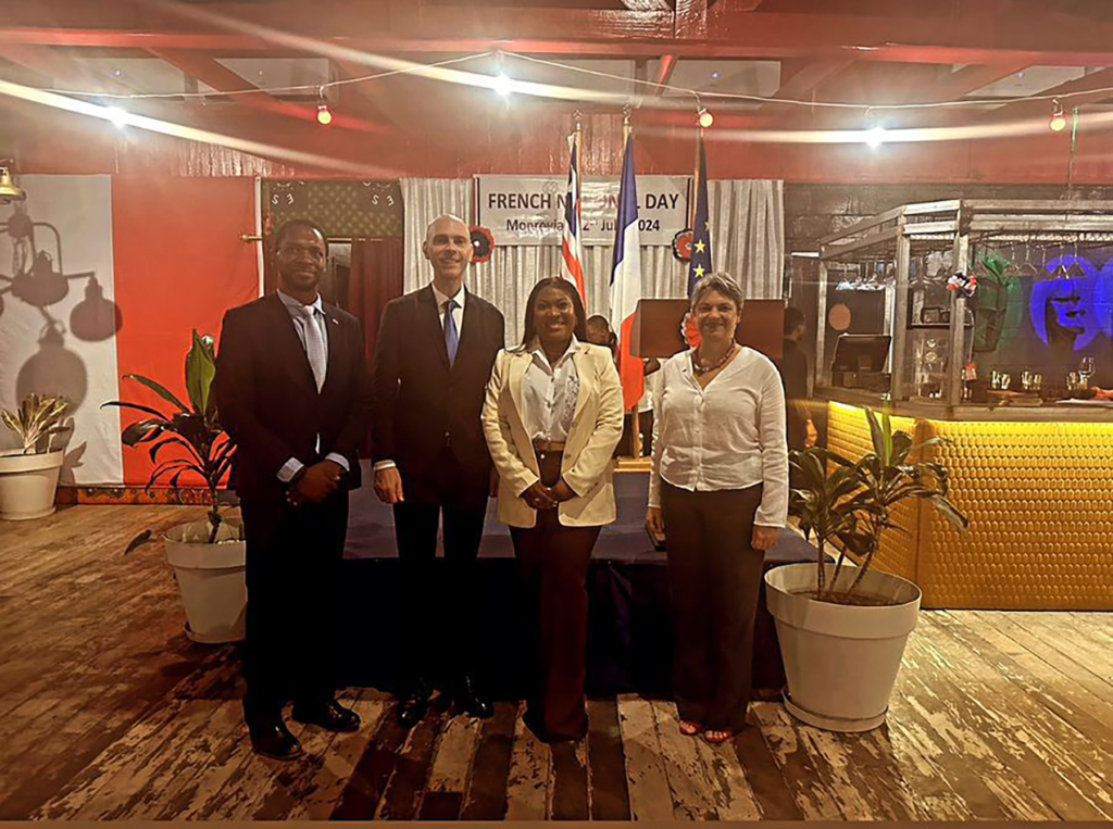 French Embassy in LIB Tunde Thomas posing with French Embassy on Bastille Day